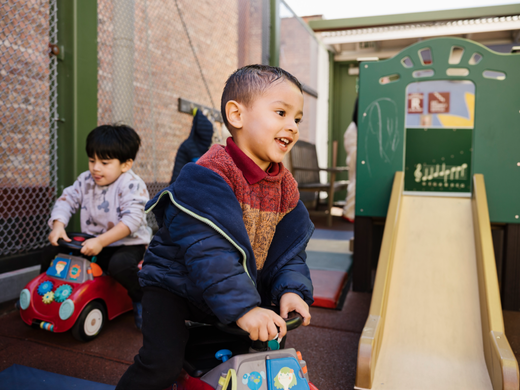 young child playing outside
